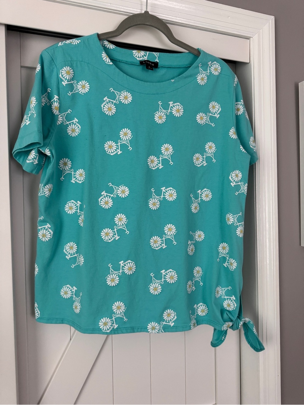 Women’s Teal Daisy Bicycle Short-Sleeve Top